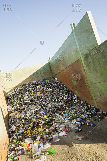Oxfordshire, England - January 4, 2016: Heap of recycled bottles at a recycling center.