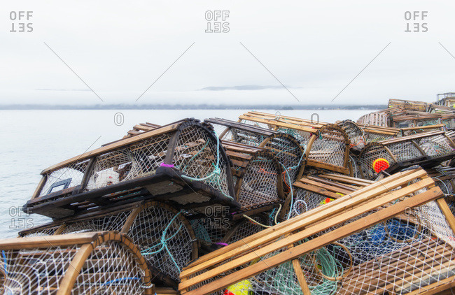 Lobster traps randomly stacked, Ingonish, Cape Breton, Nova Scotia, Canada