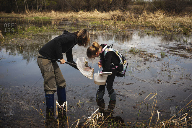 rubber boots in water