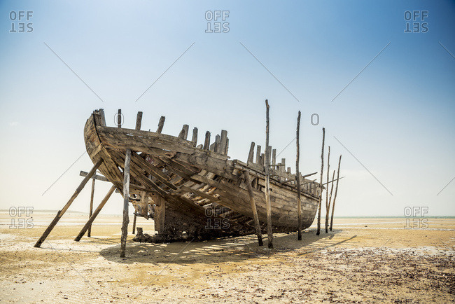 Wrecked fishing boat on Vilanculos beach, Bazaruto Archipelago, Mozambique