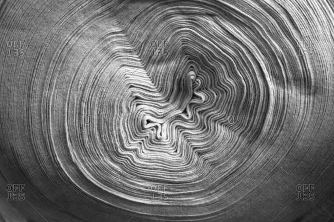 Ripples in the center of a tightly-wound roll of material