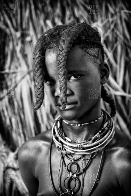 Namibia, Africa - 5/30/14: Black and white portrait of young Himba girl