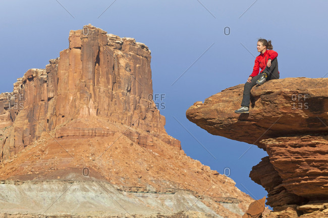 A woman falling while rock climbing in Long Canyon, Moab, Utah Stock Photo  - Alamy