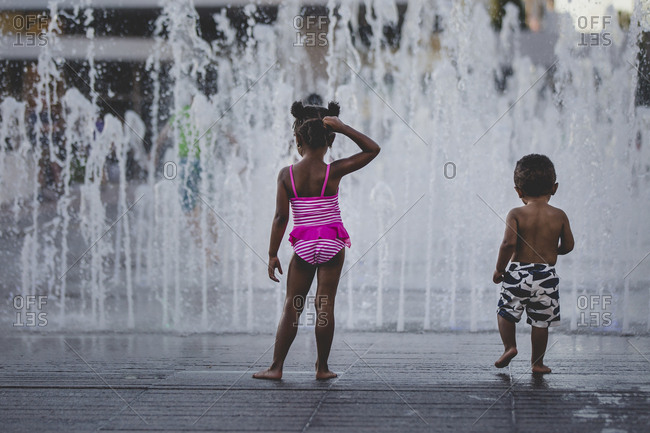 Children playing in an urban splash pad