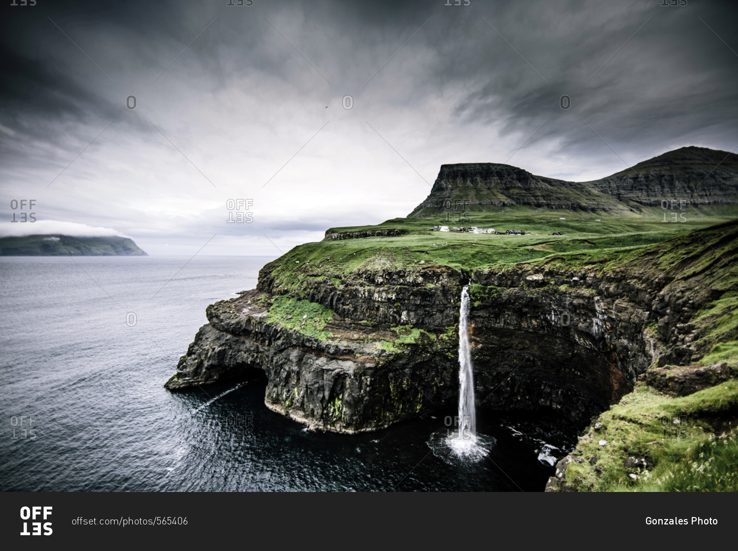 Gasadalur, Faroe Islands - July 23, 2014. Waterfall in Gasadalur, which is a village on Vagar in the Faroe Islands.