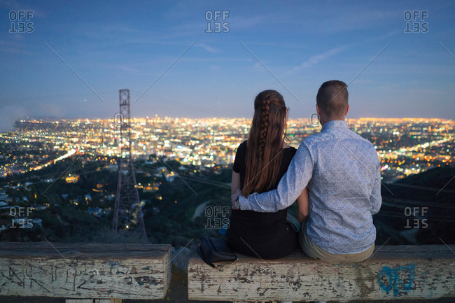 Rear view of couple looking away at view, Runyon Canyon, Los Angeles, California, USA