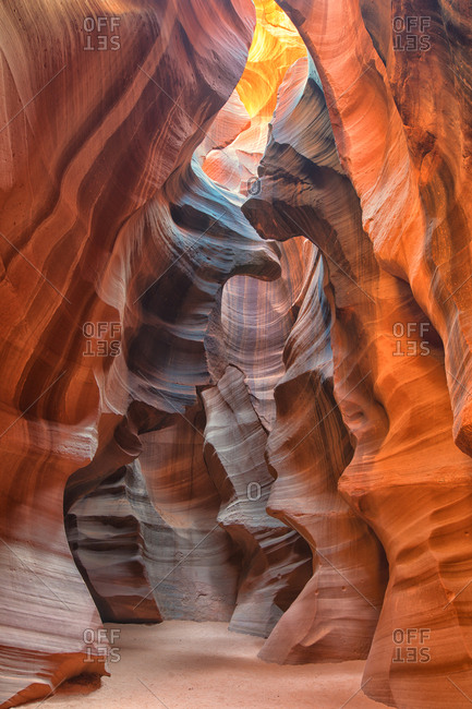 Light shining from above on curved canyon walls in Antelope Canyon, Arizona