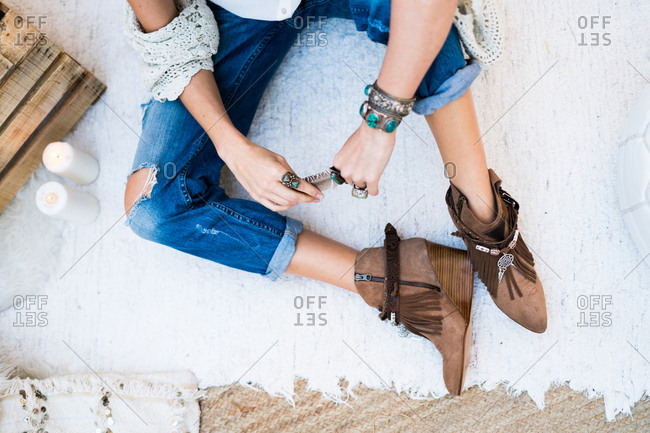 Crop shot of female with feather