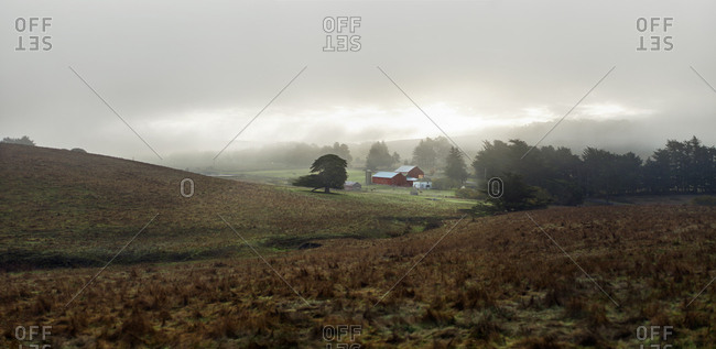 Hills and a distant barn