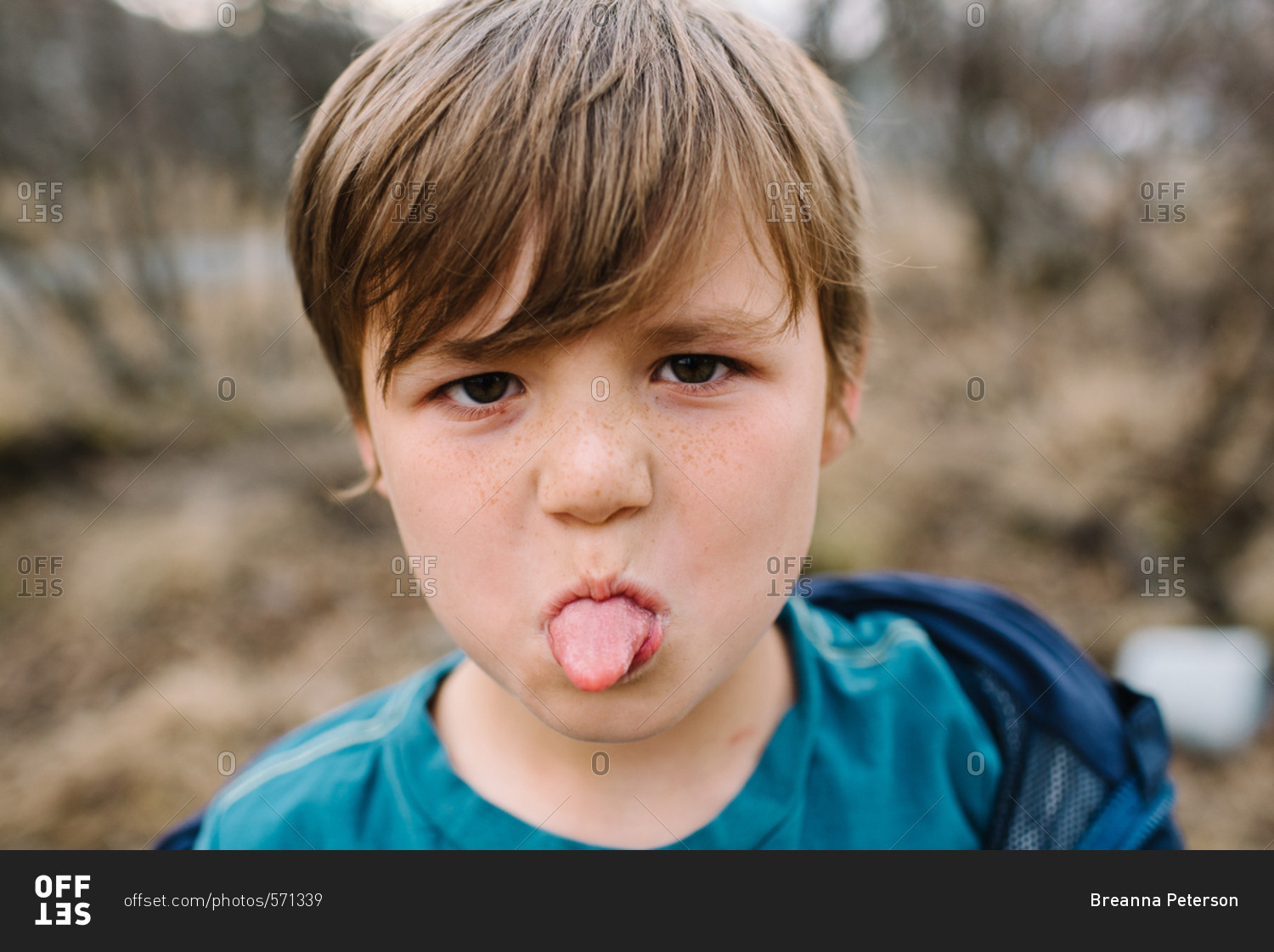 Kid Sticking His Tongue Out