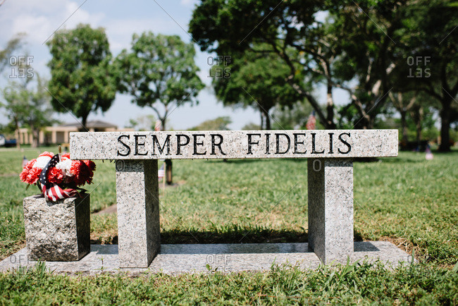 Memorial Bench At Cemetery With Semper Fidelis Written On It