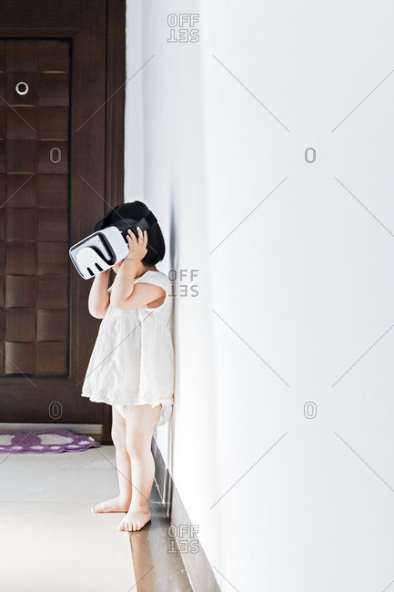 Asian little girl with virtual reality headset