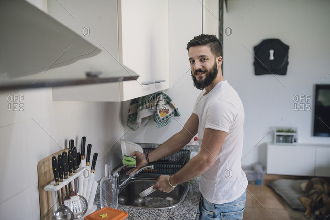 Young Man Washing Dishes | Stock Images Page | Everypixel