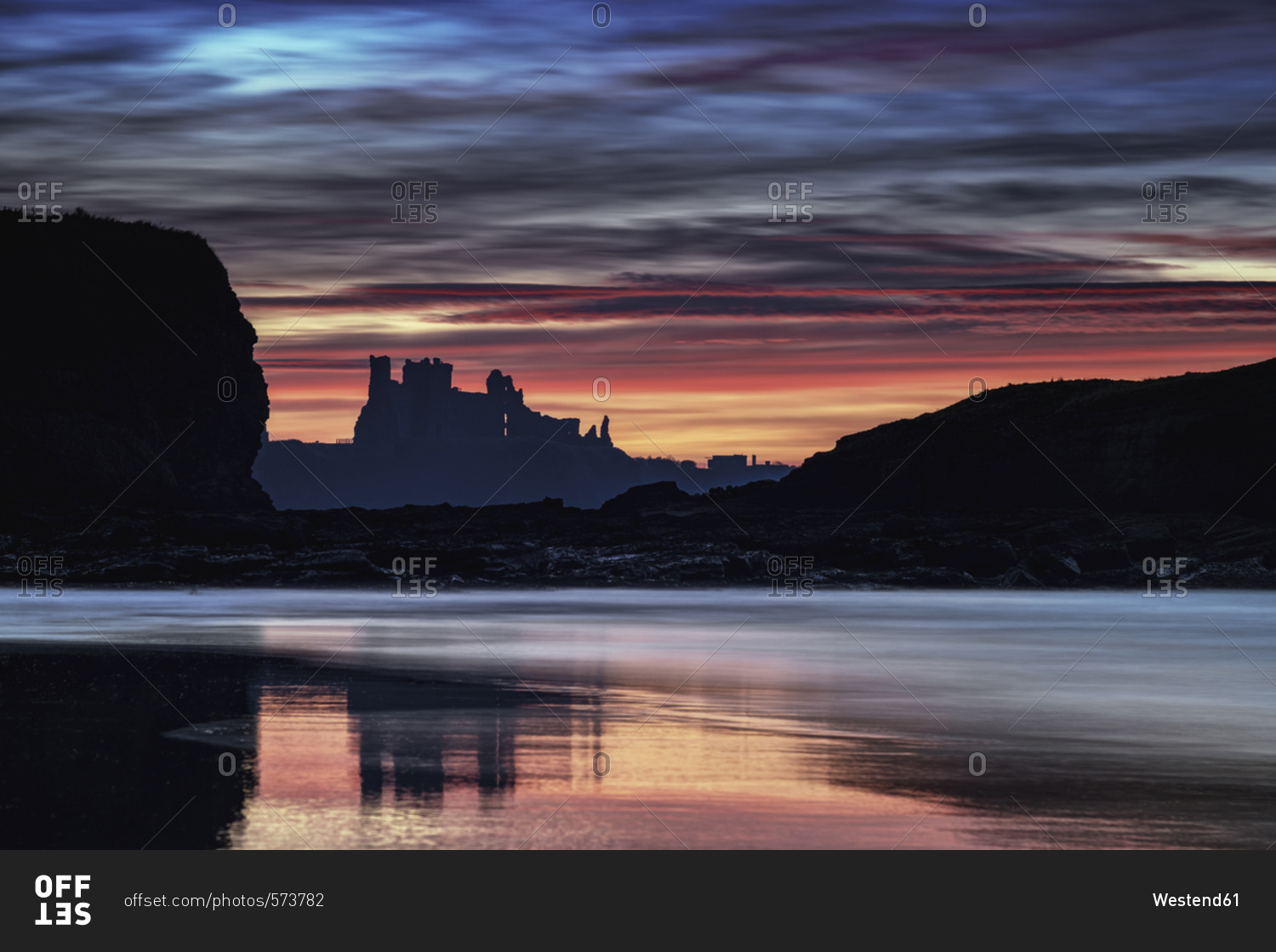 UK- Scotland- East Lothian- Tantallon Castle at sunset from Seacliff beach