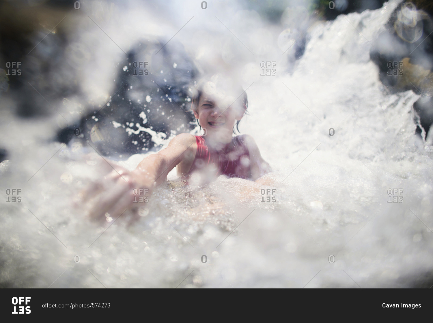 Boy enjoying in Bua Thong Waterfalls