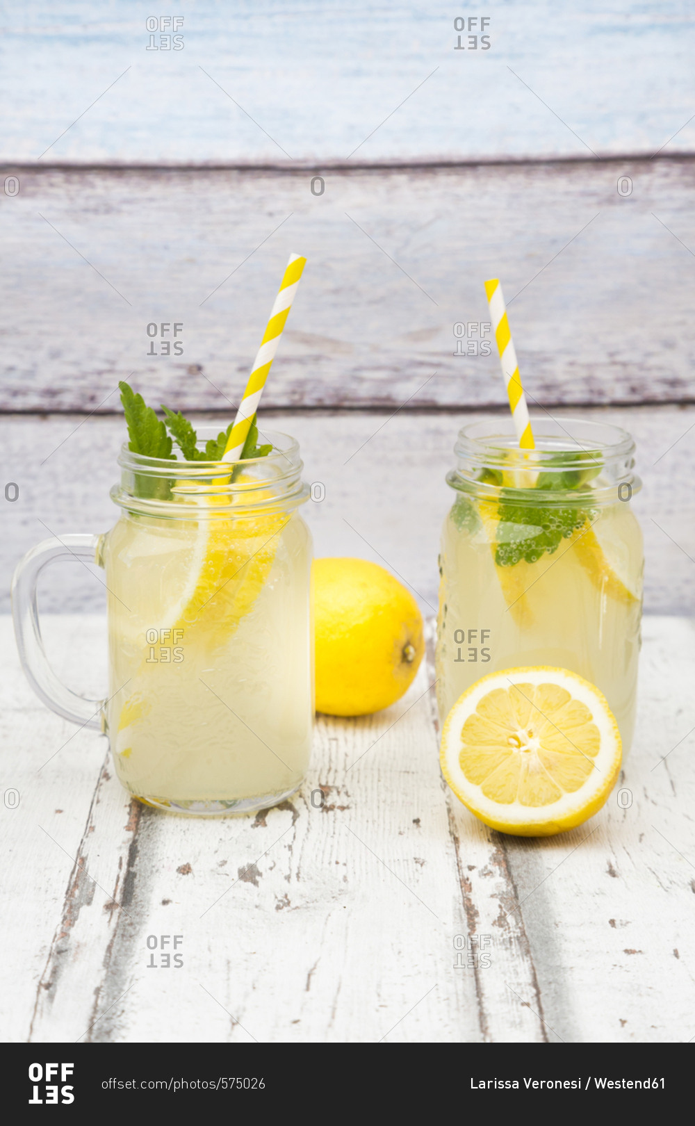 Two glasses of cooled lemonade flavoured with lemon balm