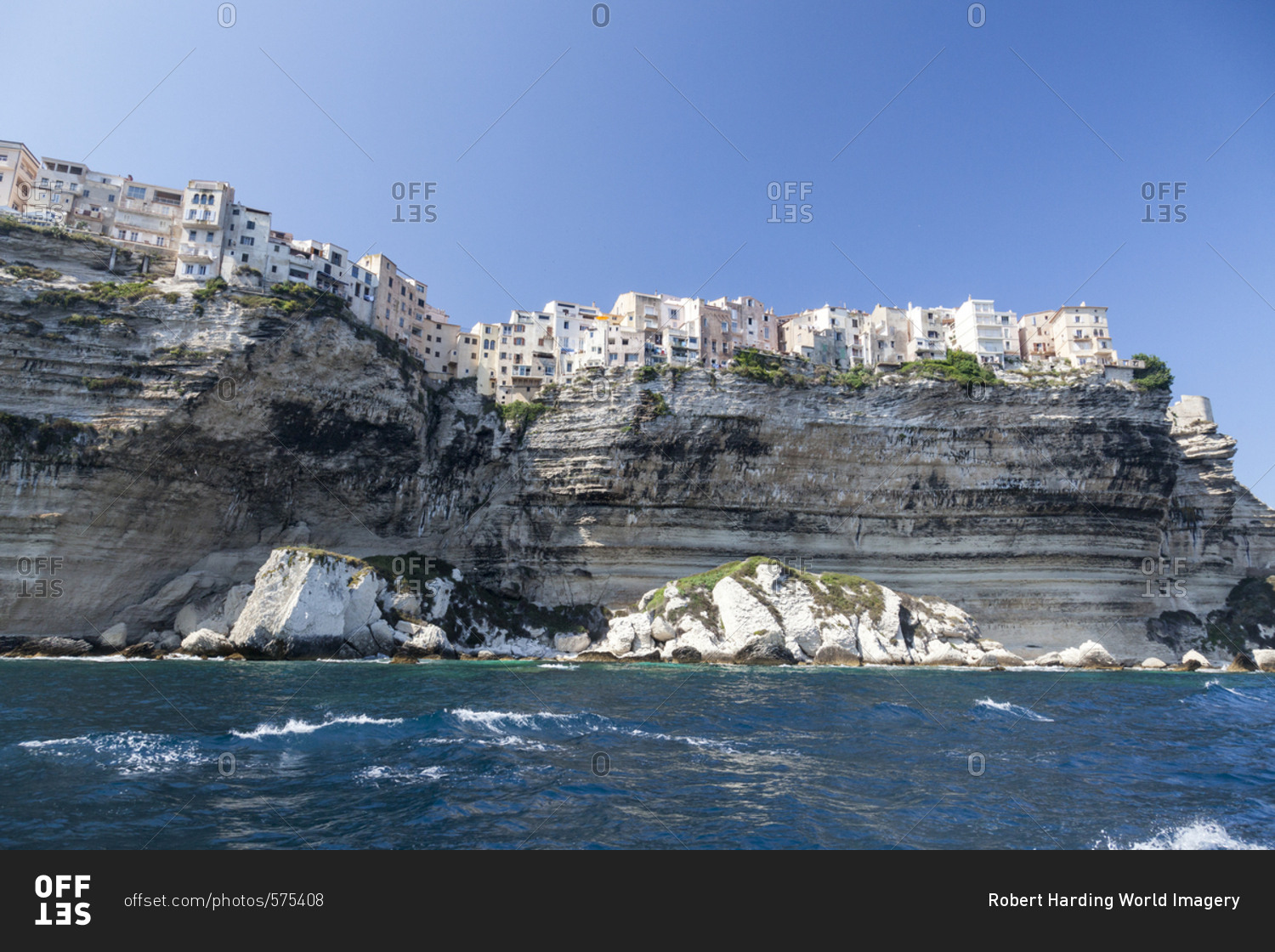 The turquoise sea frames the ancient village perched on the white cliffs Lavezzi Islands Bonifacio Corsica France Europe