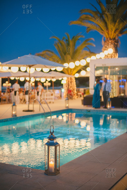 Poolside wedding reception at dusk, Portugal