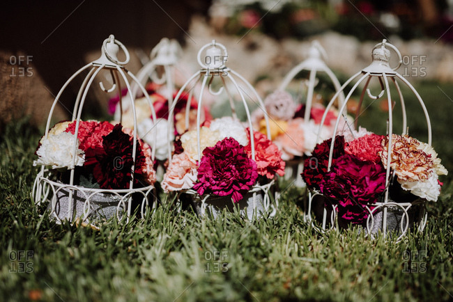 Wedding floral arrangements in wire cages