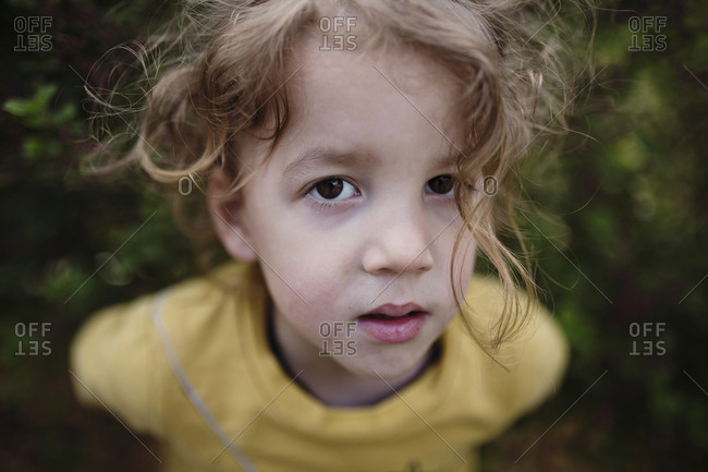 Close Up Of A Little Boy With Curly Hair Stock Photo Offset