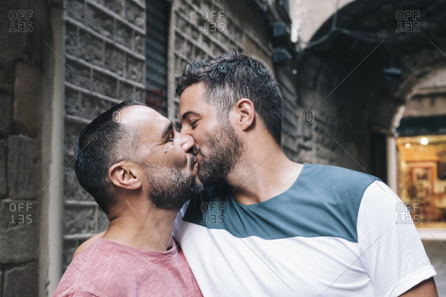 gay men kissing.