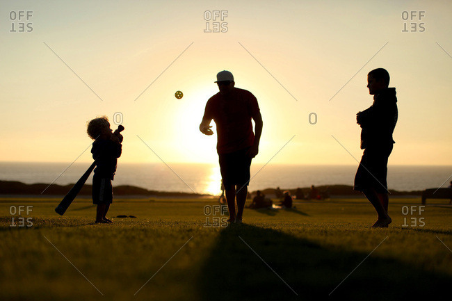 father son silhouette baseball