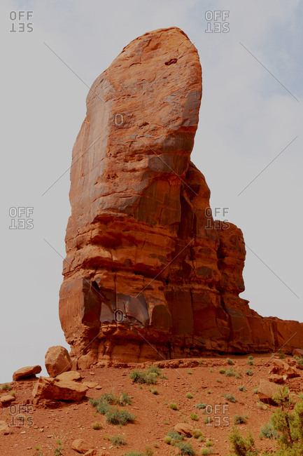 Distinctive formation of DeChelly sandstone known as The Thumb in Monument Valley.