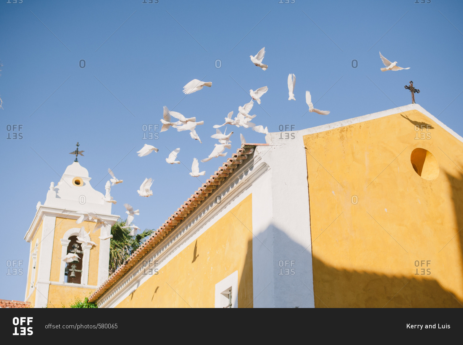 Birds flying from chapel roof - Portugal