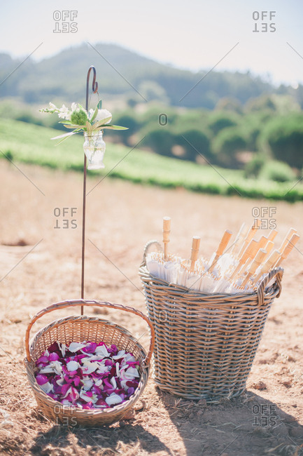 Baskets with petals and umbrellas