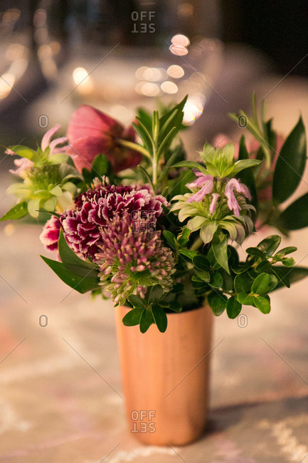 Flowers in a copper pot for wedding