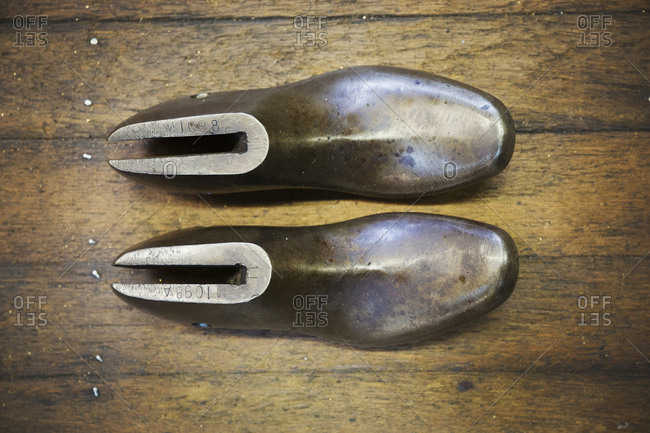 A pair of metal shoe forms, shoe lasts, in a shoemaker's workshop