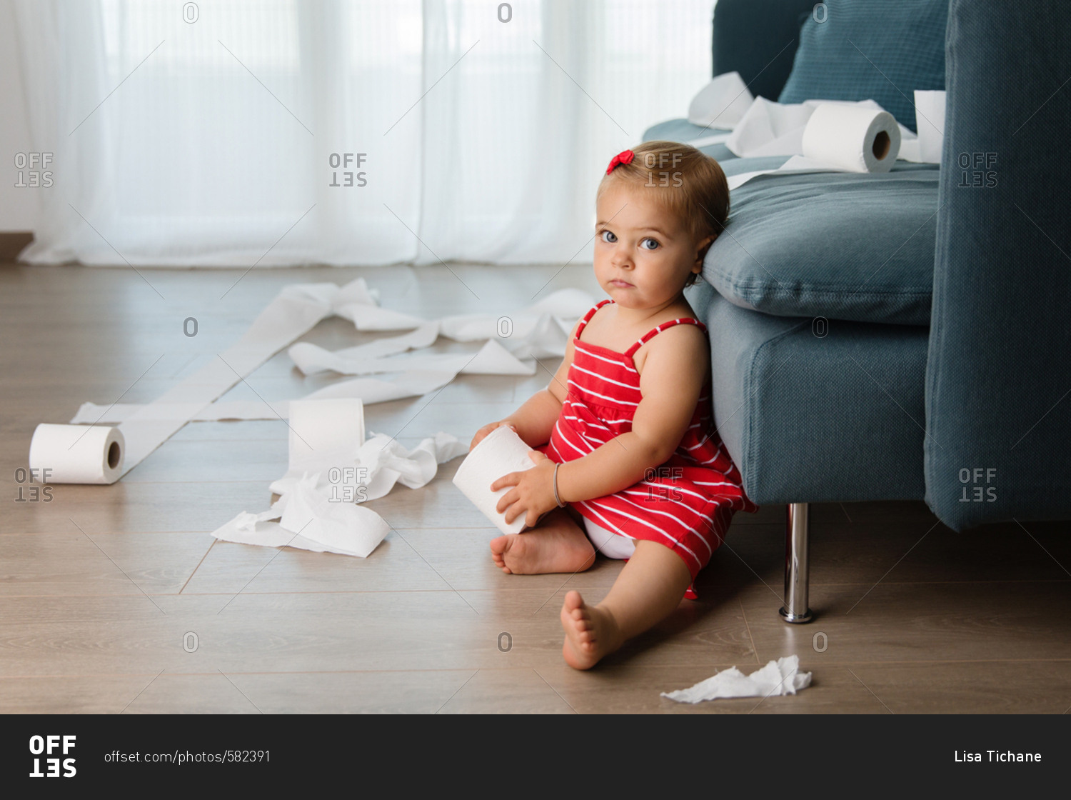 Toddler By Couch With Toilet Paper Stock Photo Offset