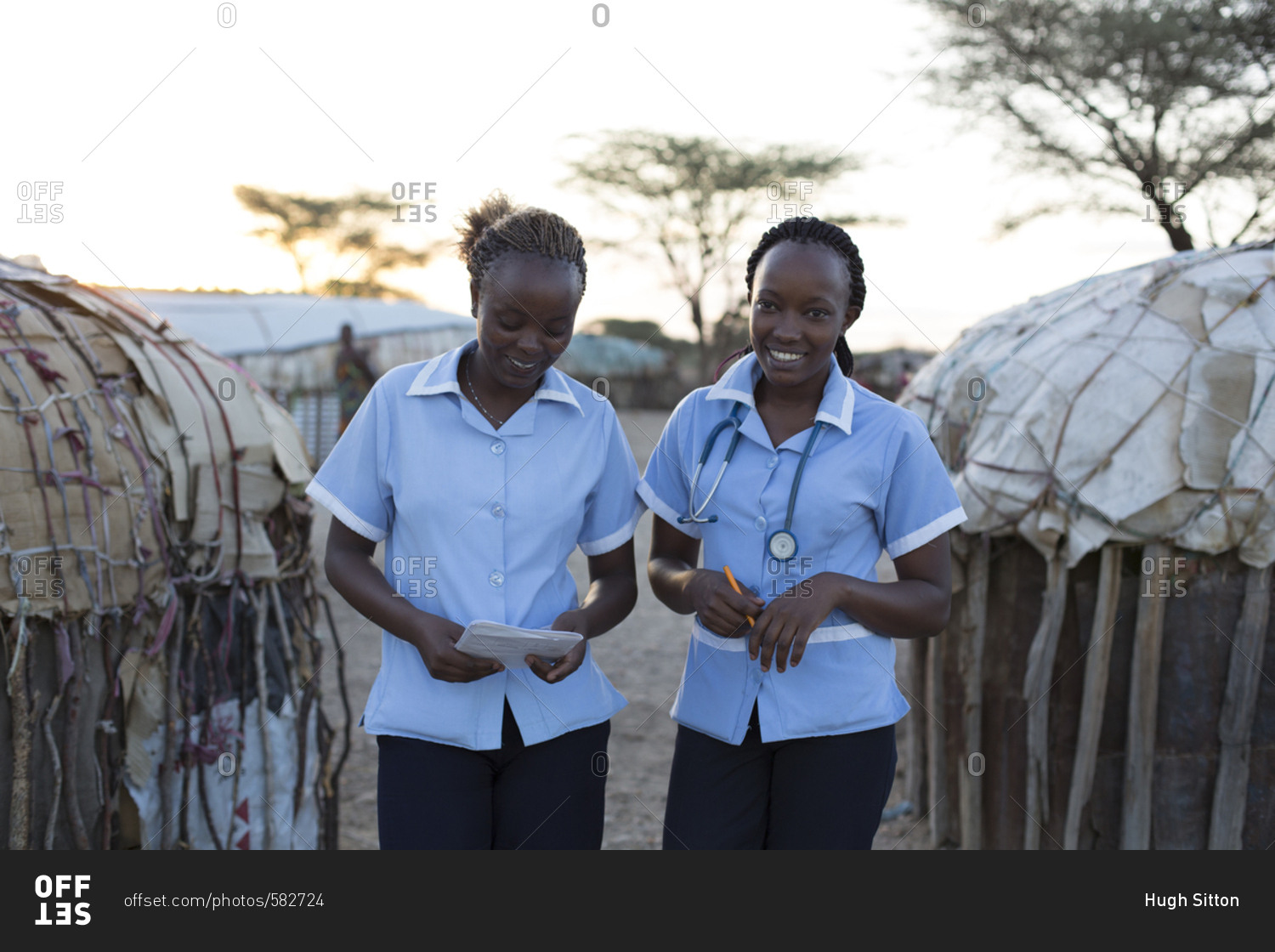 Two nurses working on location in rural village in Kenya, Africa