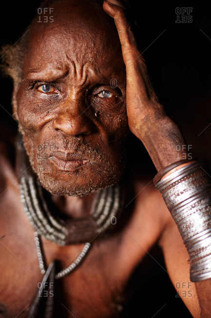 Kunene, Namibia - March 20, 2016: A portrait of a village elder in a Himba village in a northern region of Namibia