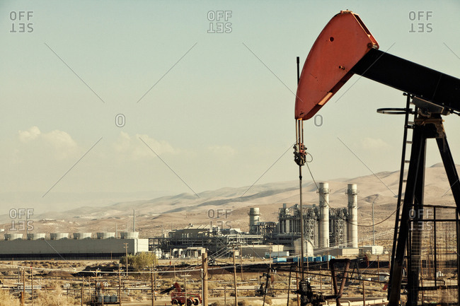 Oil pump and refinery in oil field