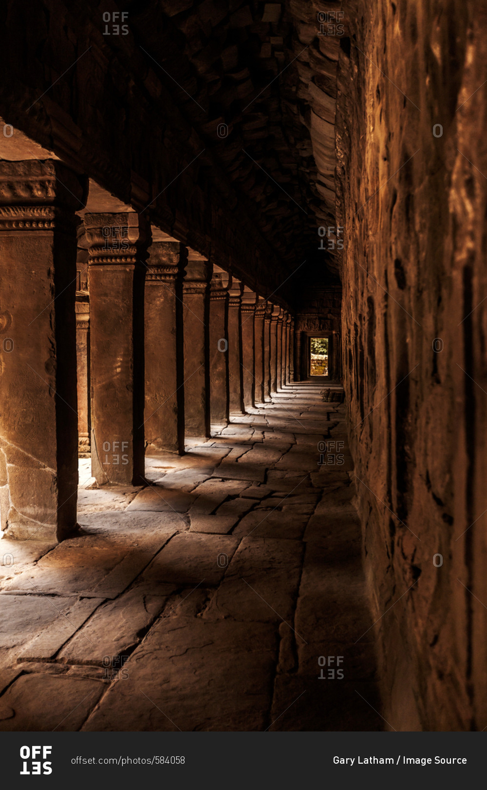 Colonnade at Ta Prohm Temple ruins at Angkor Wat, Siem Reap, Cambodia