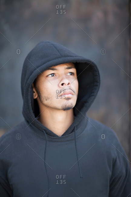 Portrait of a man wearing a hooded top