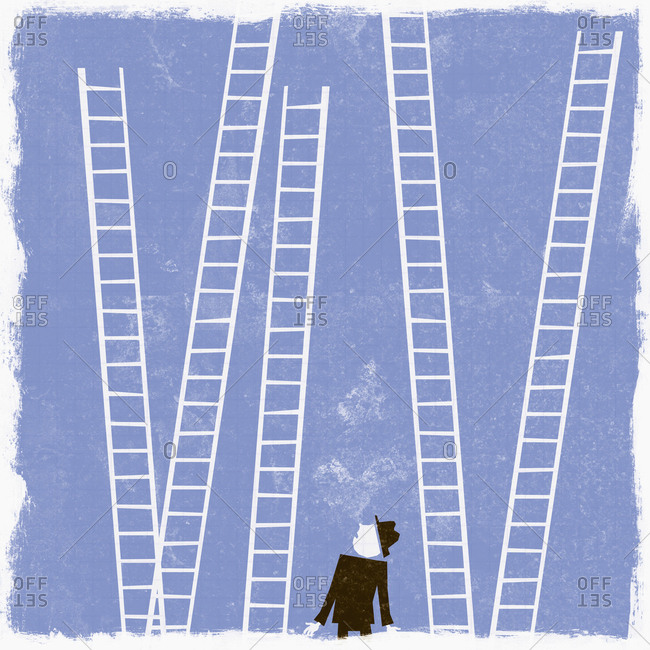 Businessman looking up at ladders