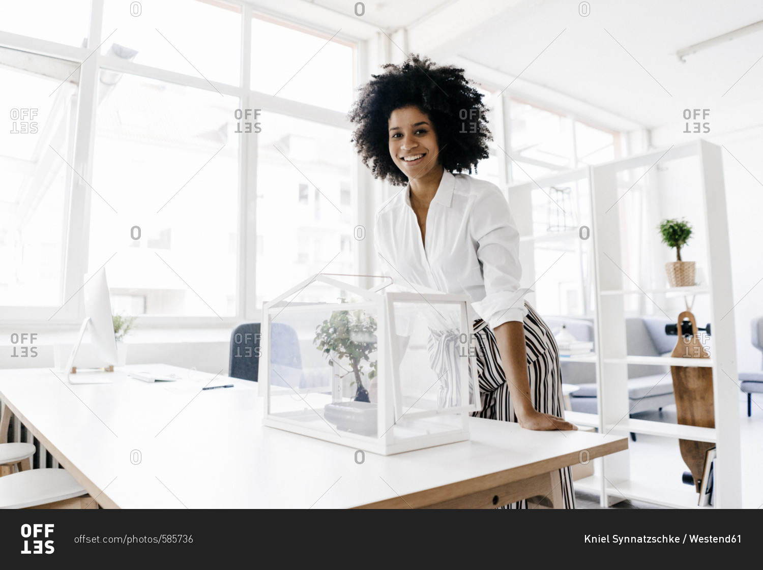 Young woman working in sustainable office
