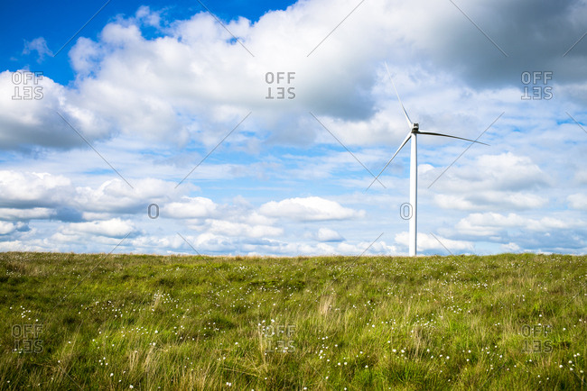 A wind turbine in a prairie setting