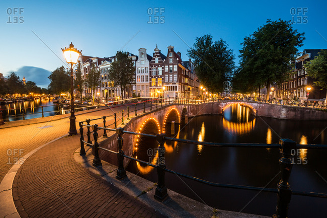 A long exposure of Amsterdam's southern canal rings at the intersection of Leidsegracht and Keizersgracht, Amsterdam, The Netherlands, Europe