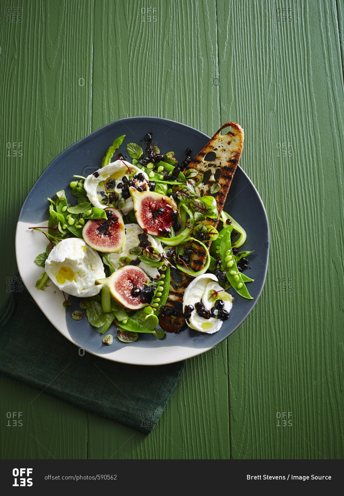 Plate of pea Salad - figs, balsamic glaze, burrata, micro herbs, asparagus and grilled sourdough bread