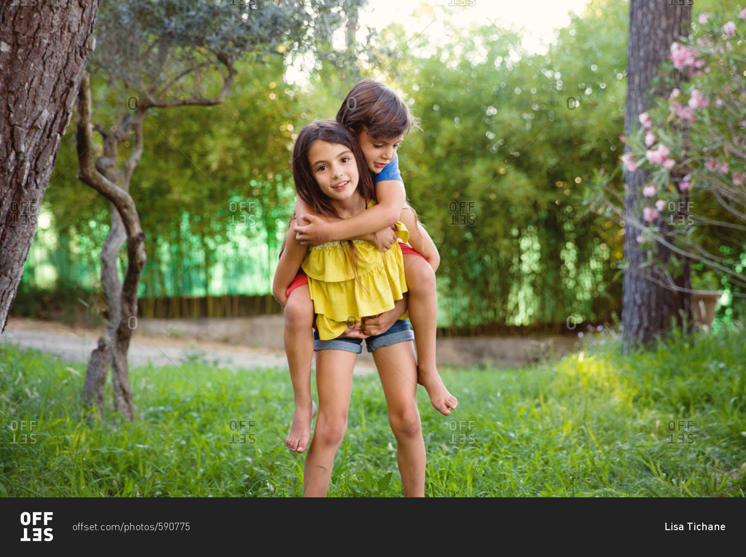 boy carrying girl