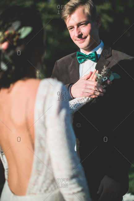 Alternate bridal couple at spiritual wedding ceremony outdoors, lover's vow, portrait