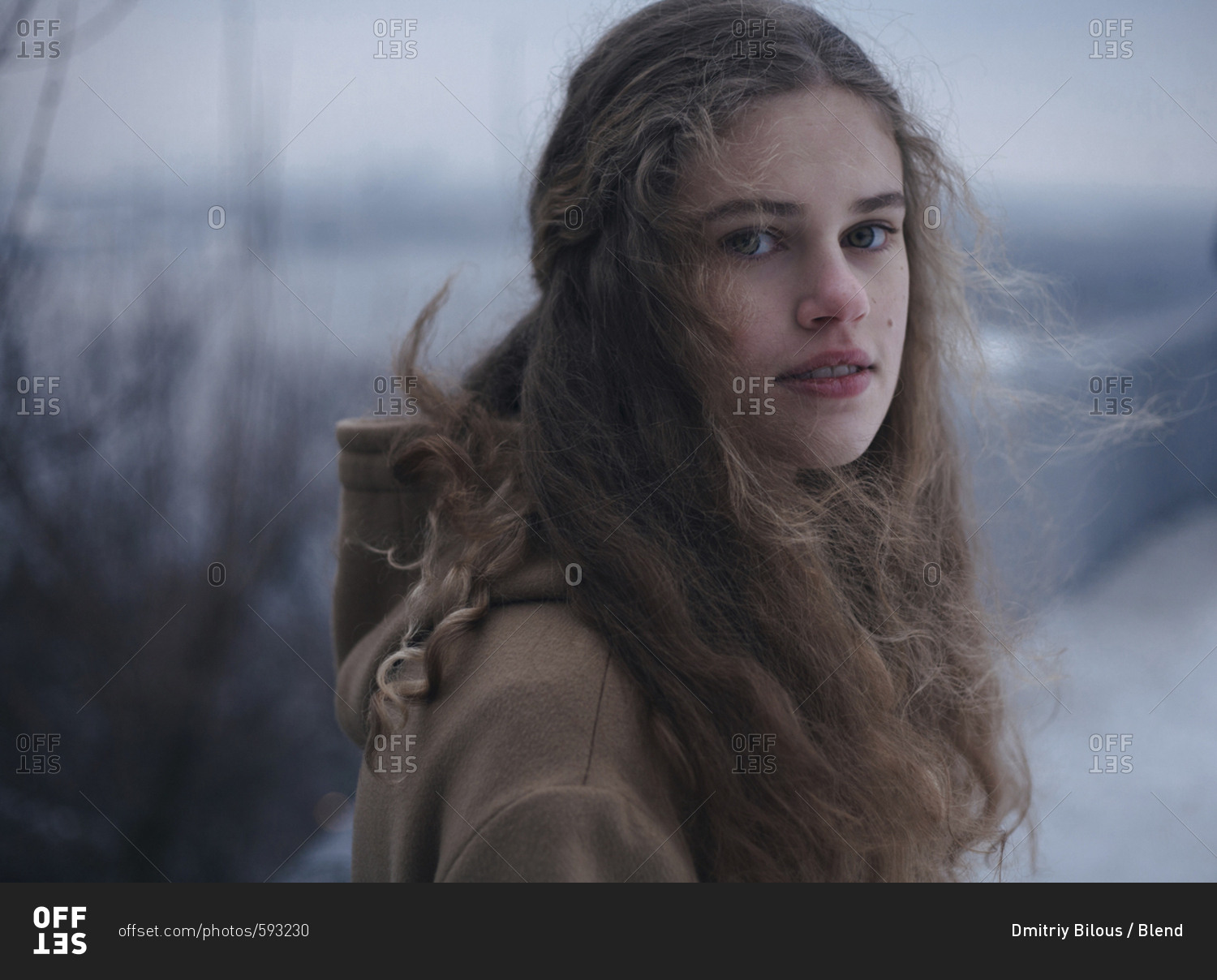 Portrait of wind blowing hair of serious Caucasian teenage girl stock ...