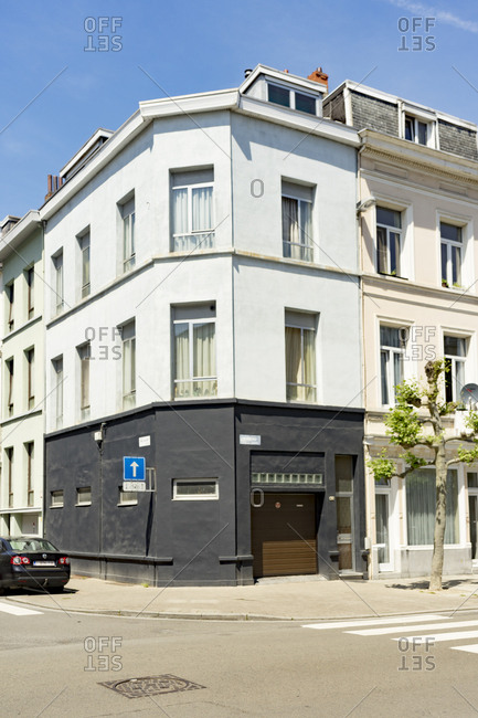 Antwerp, Belgium - June 1, 2017: Exterior of apartment buildings with a garage in Antwerp, Belgium