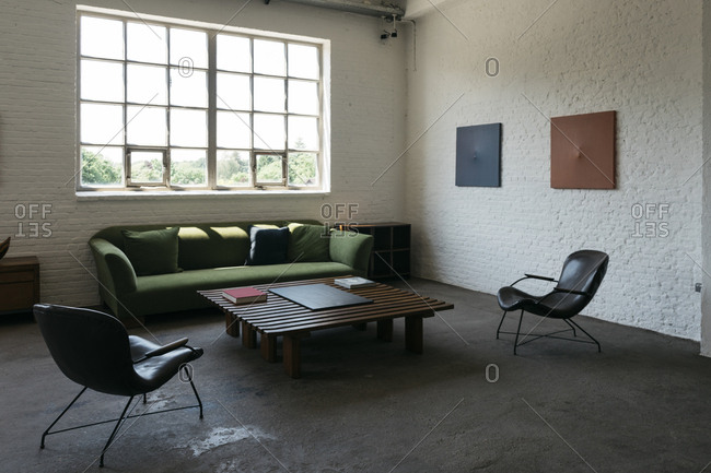 Antwerp, Belgium - June 2, 2017: Living room in a home in Kanaal development in Antwerp, Belgium