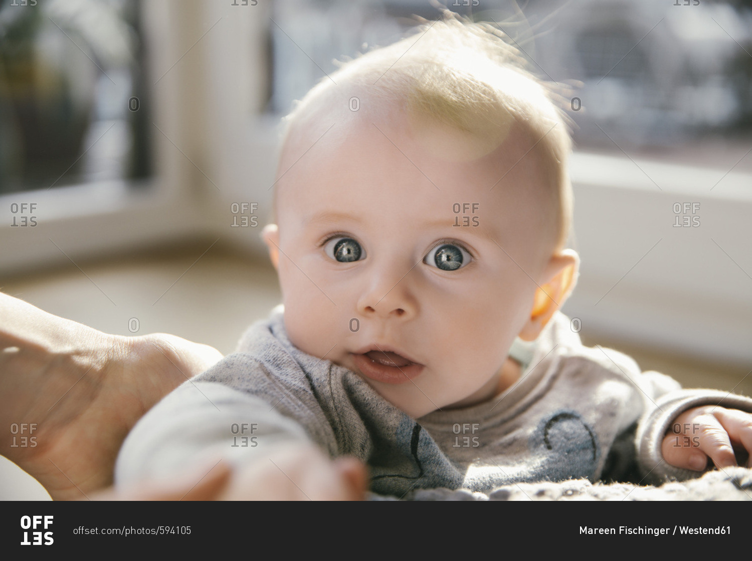 Portrait of amazed baby boy