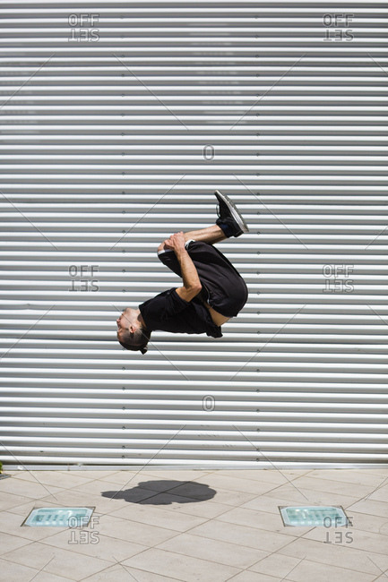 Man exercising Parkour discipline in the city