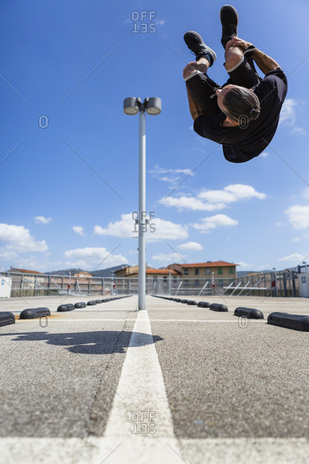 Man exercising Parkour discipline in the city